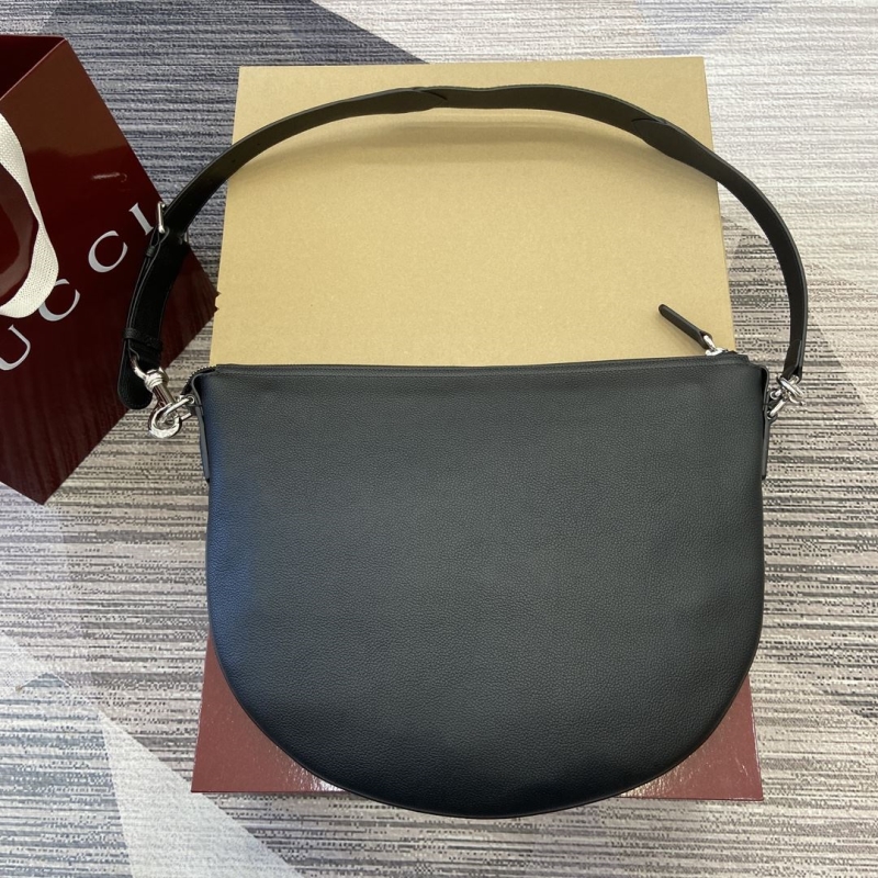 G*u*i top handle bags